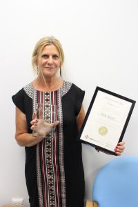 Dee Wyatt, ILLY Practitioner of the Year 2017, with her trophy and certificate. Dee Works at Inclusion's Recovery service in Eastleigh, Hampshire.
